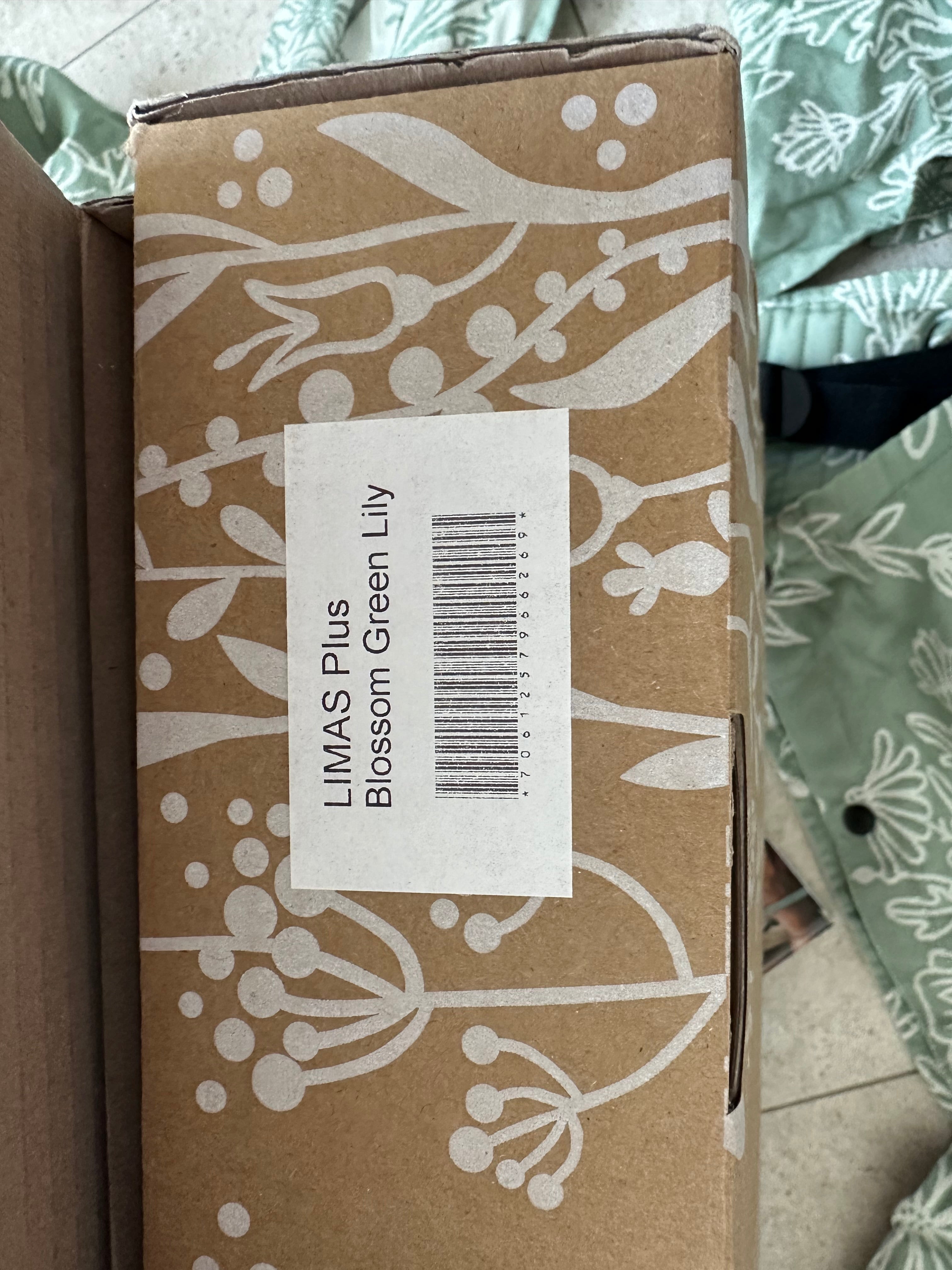 Stokke Limas Plus „Blossom green lily“ – Ergonomische Babytrage mit maximalem Komfort